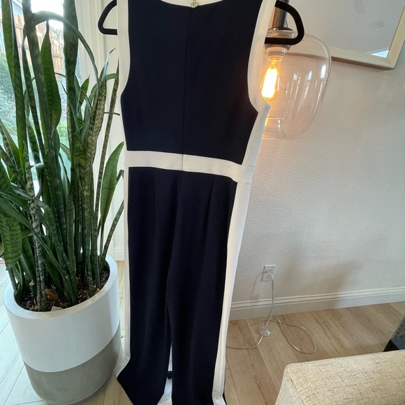 One piece jumpsuit in a stretchy lightweight knit fabric by Tommy Hilfiger. - Picture 2 of 4